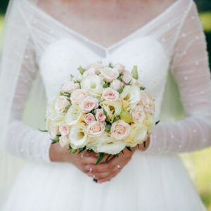 Bride holding bouquet in hands