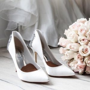 Bridal shoes & flowers bouquet